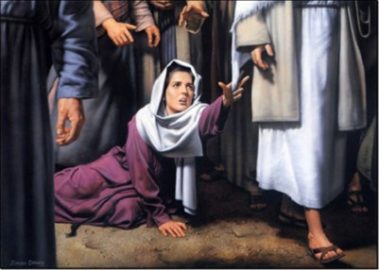donna che tocca Gesu.jpg